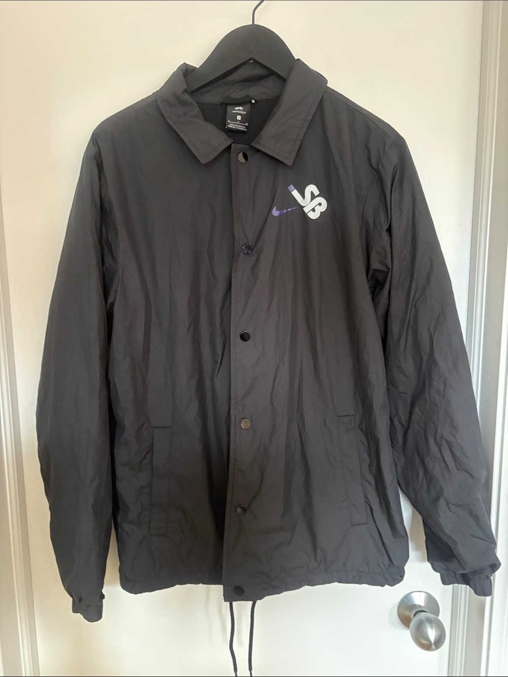Nike SB Black Windbreaker Coach Jacket graphic on back